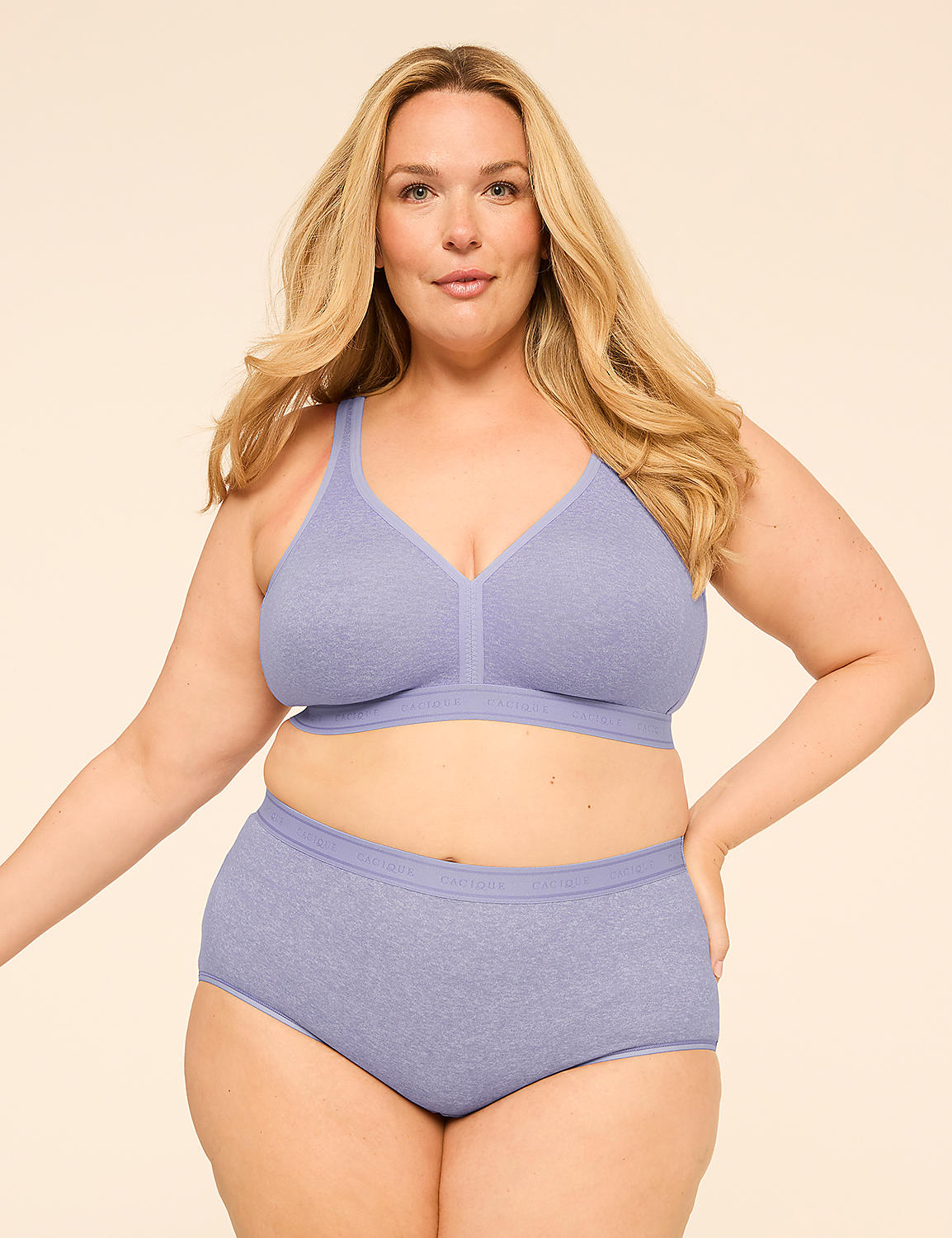 A woman in a light purple bra and matching underwear stands against a plain, light-colored background. Product Image 4
