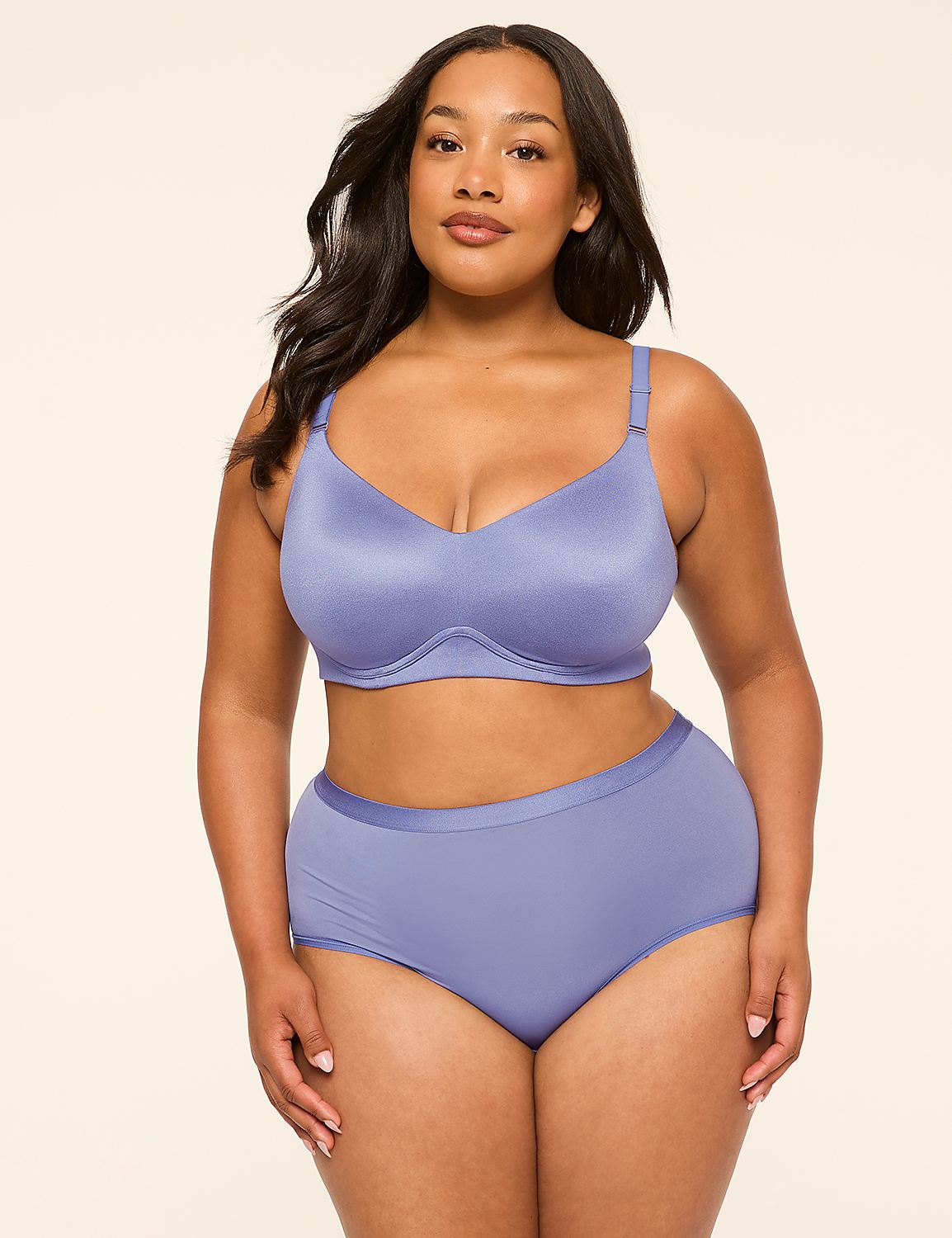 A woman in a purple bra and underwear stands against a plain, light-colored background. Product Image 4