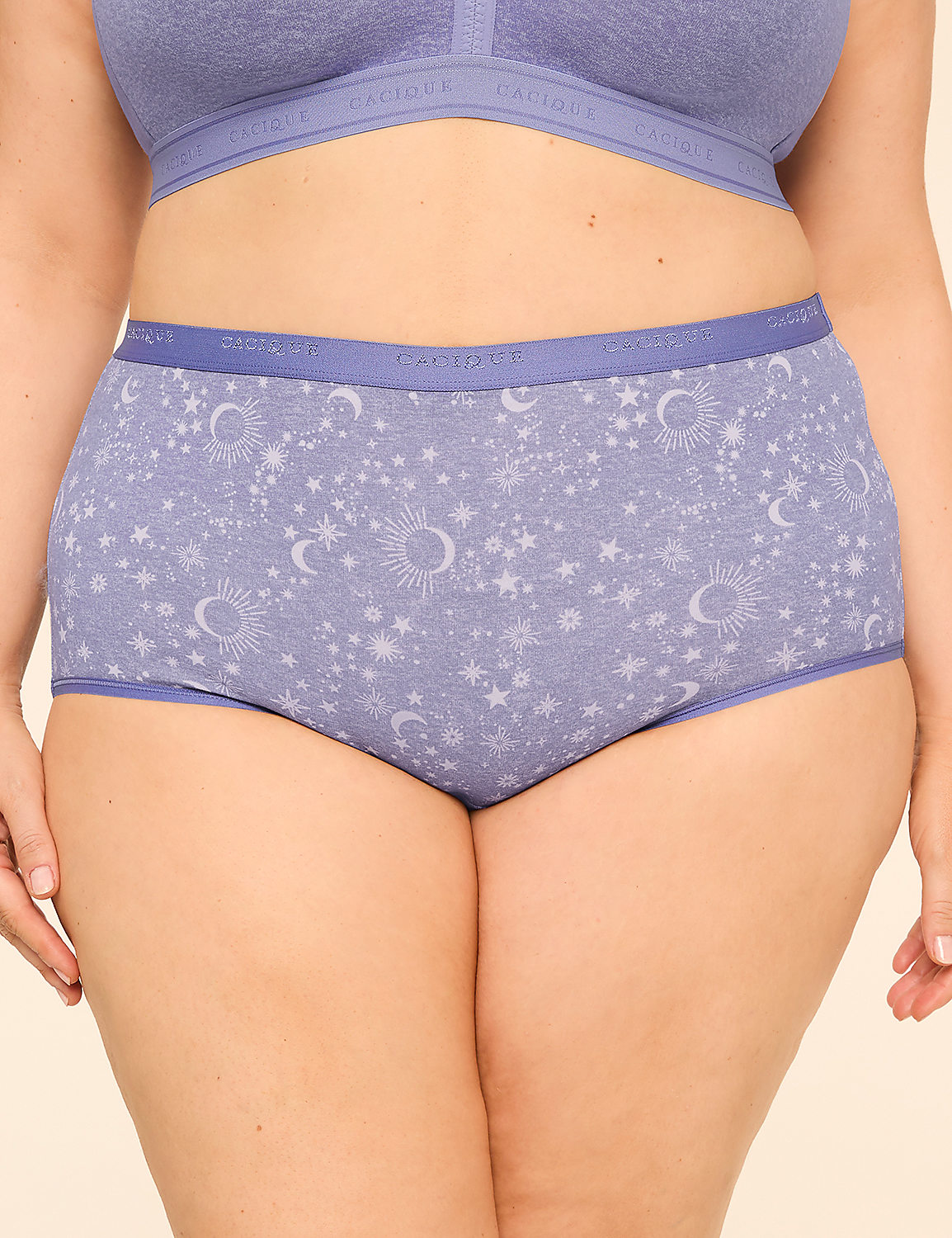 A person is wearing light purple underwear with a celestial pattern, and a matching bra, against a plain background. Product Image 1
