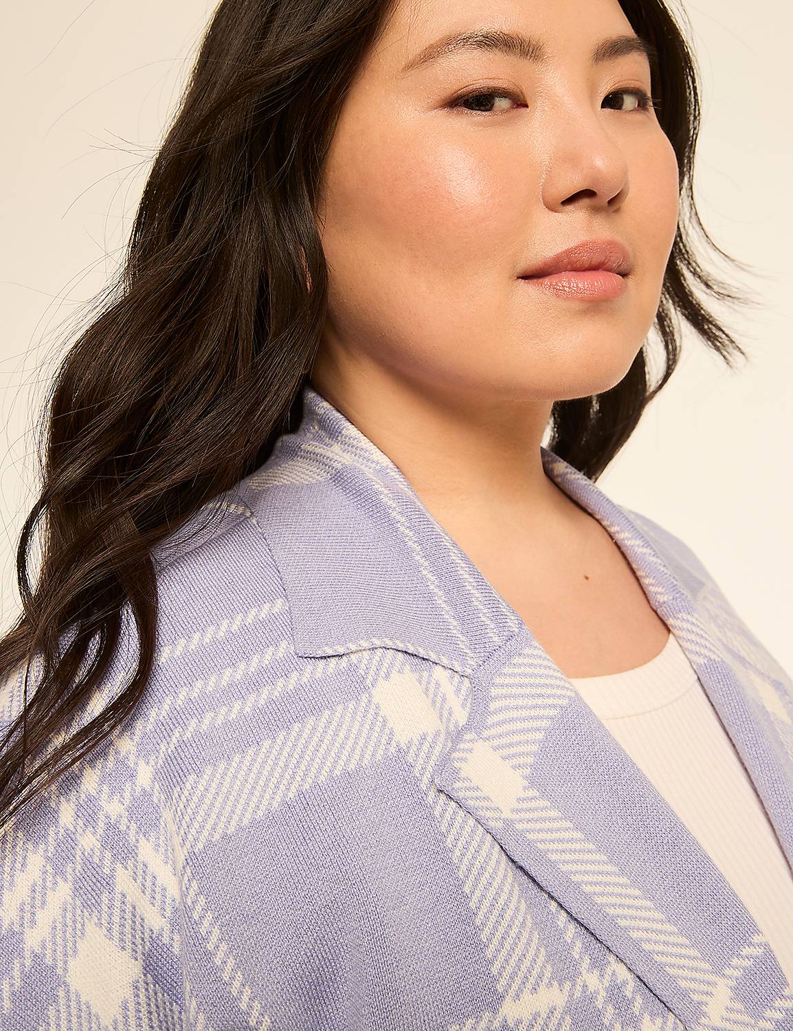 A woman with dark hair and fair skin wears a light purple and white plaid blazer over a white shirt, with a plain, light-colored background. Product Image 3