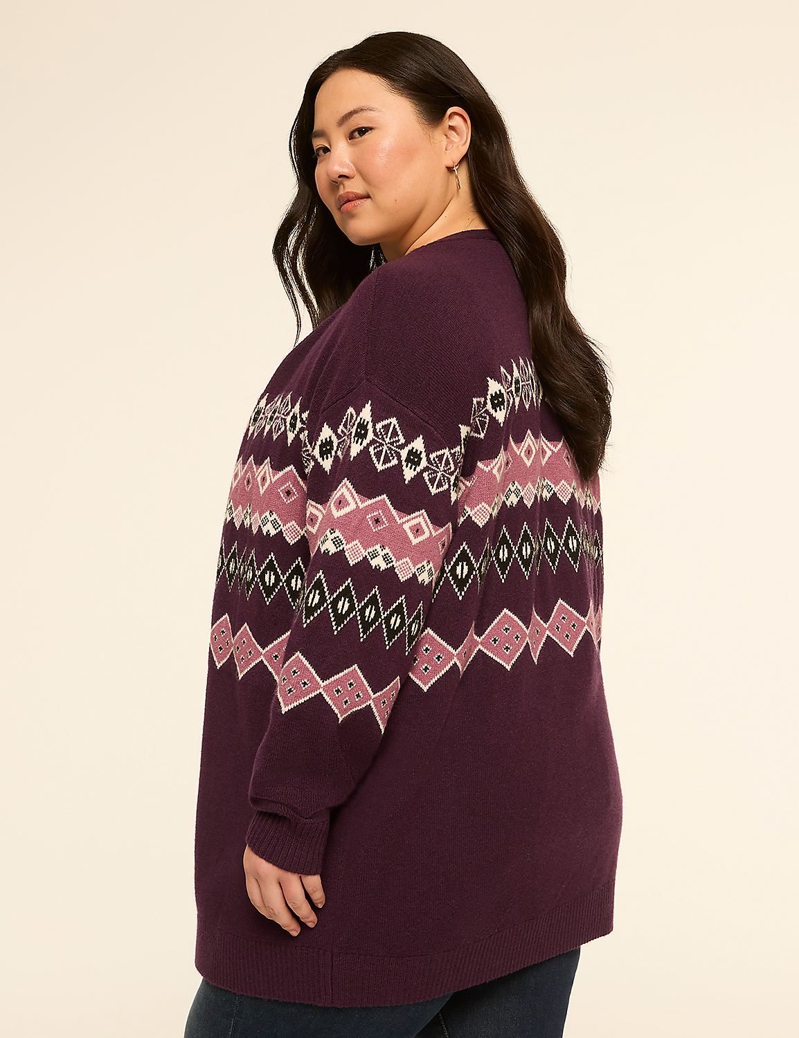 A woman in a purple Fair Isle sweater stands against a plain, light-colored background. Product Image 2