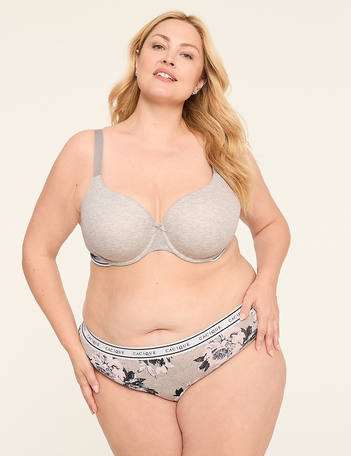 A woman in a grey bra and floral underwear stands against a plain, light background. Product Image 4