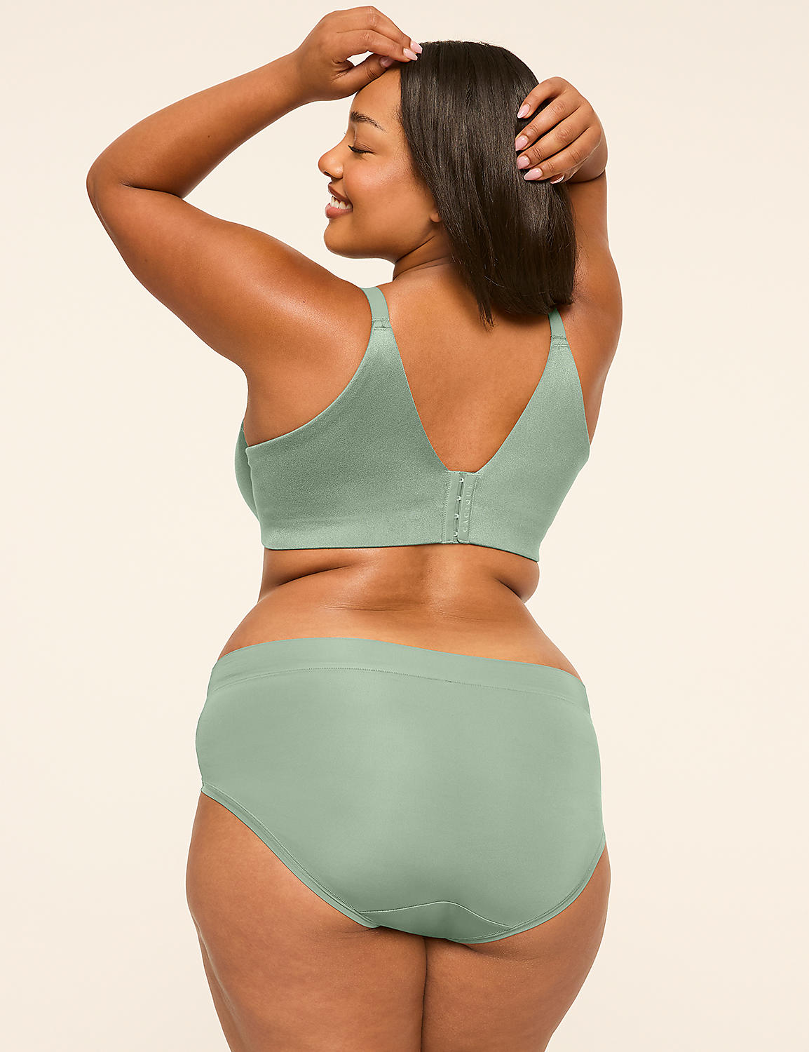 A woman in a sage green bra and underwear poses with her back to the camera against a plain, light-colored background. Product Image 2
