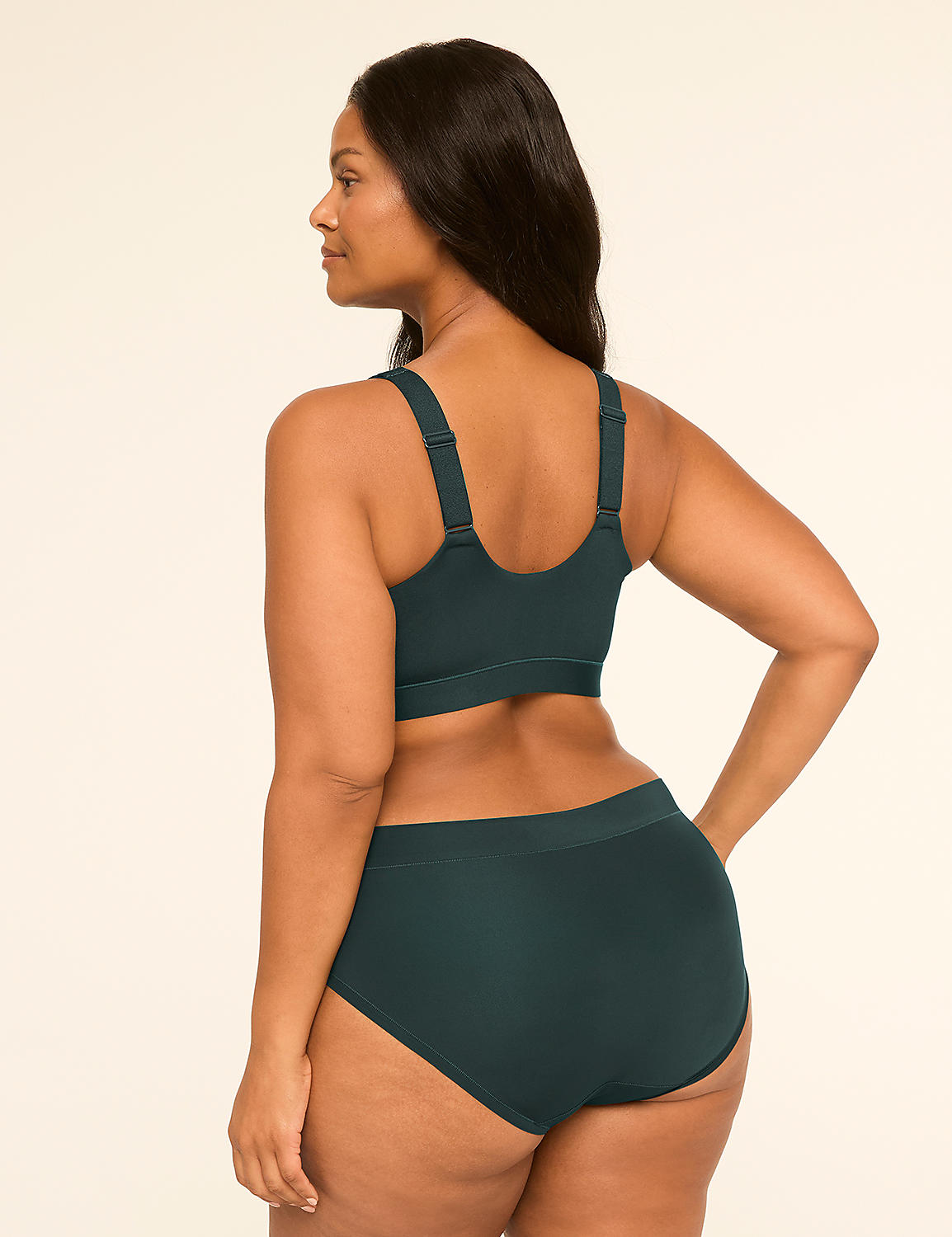 A woman in dark green lingerie stands against a plain, light background. Product Image 2