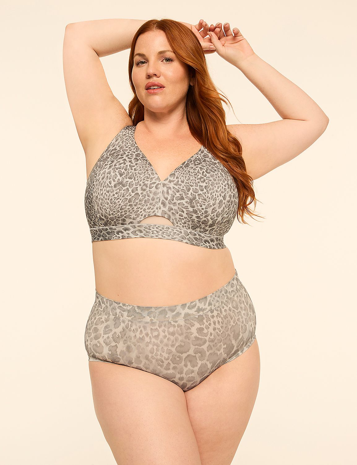 A woman with red hair poses in a leopard-print bra and underwear against a plain, light-colored background. Product Image 4