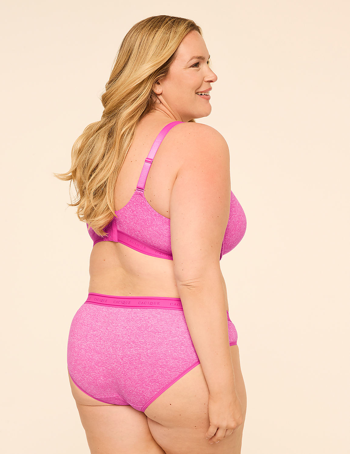 A woman in a pink bra and underwear stands against a plain, light-colored background. Product Image 2