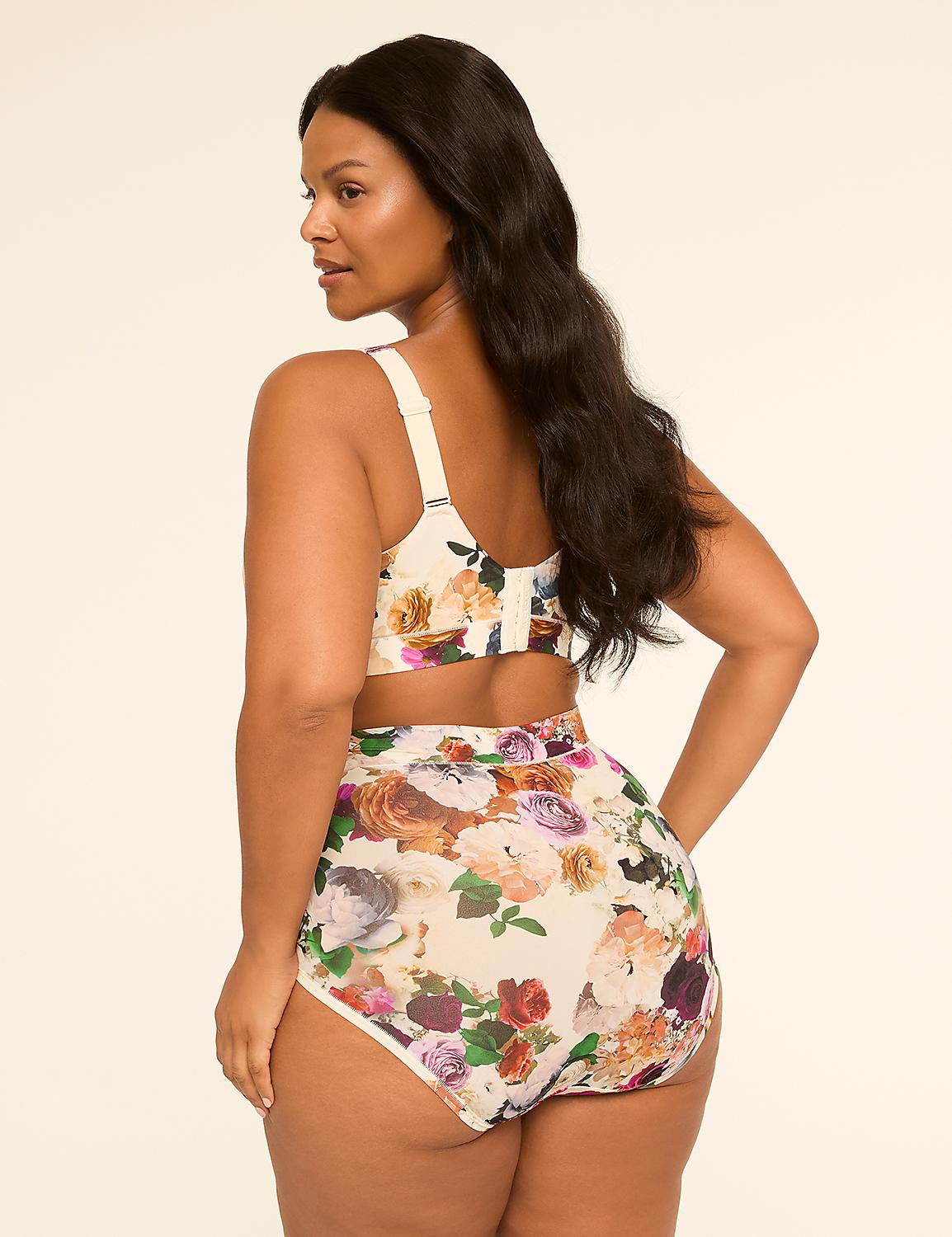 A woman in a floral bikini stands against a plain, light-colored background. Product Image 2