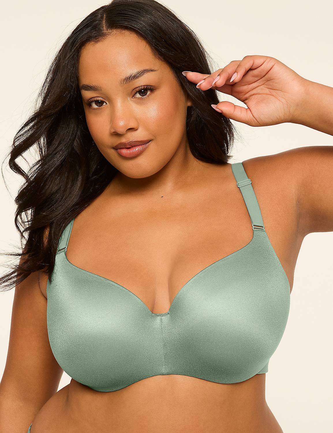 A woman with dark hair and olive skin wears a light green bra, with a plain, light-colored background. Product Image 1