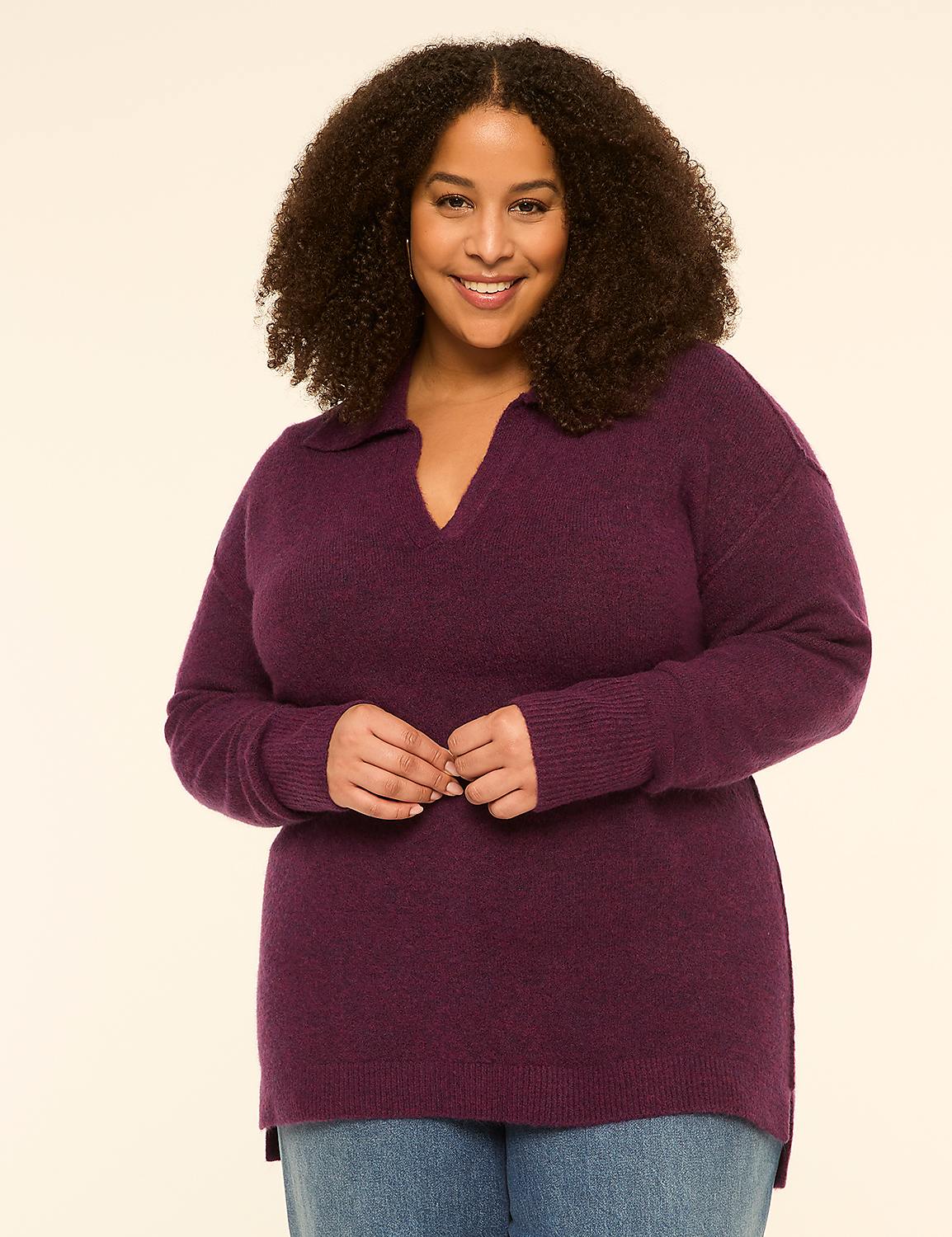 A smiling woman with curly hair wears a purple sweater and jeans against a plain, light background. Product Image 1