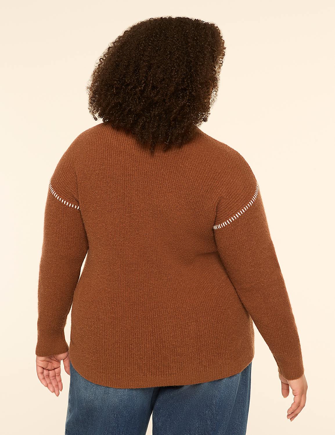 A person wearing a brown sweater and blue jeans stands against a plain, light-colored background. Product Image 2