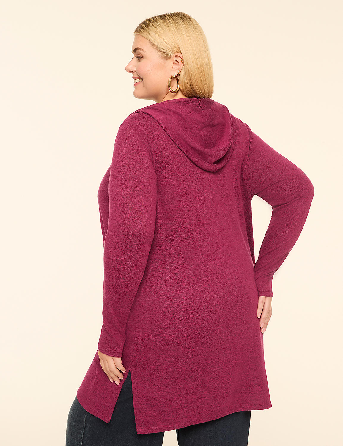 A woman in a magenta hooded cardigan stands against a plain, light-colored background. Product Image 2