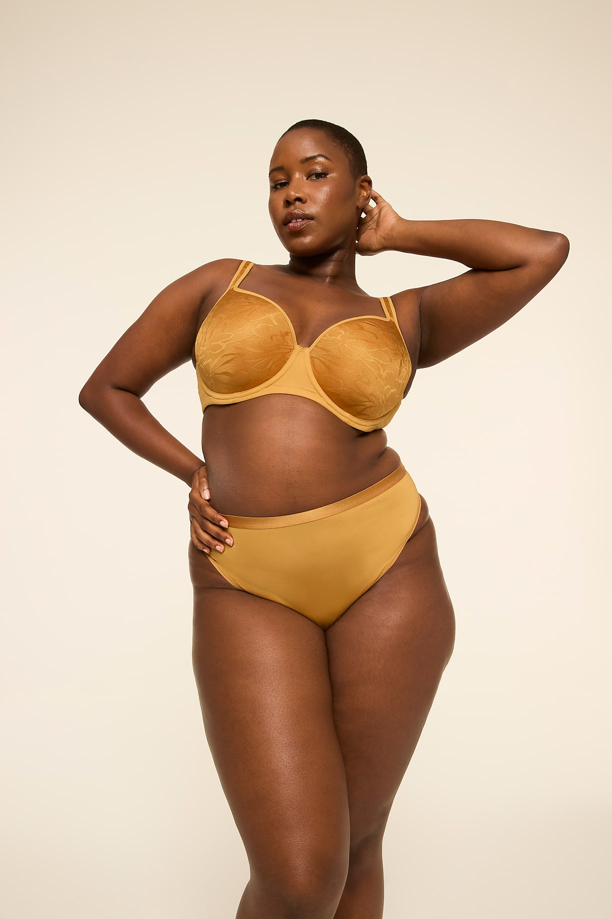 A woman in a mustard-colored bra and underwear poses against a plain, light background. Product Image 7