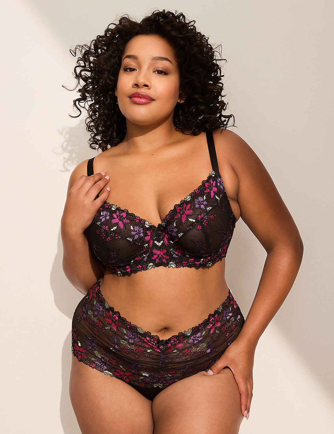 A person's lower back and buttocks are shown in the foreground, wearing floral lace underwear, against a plain white background. Product Image 3