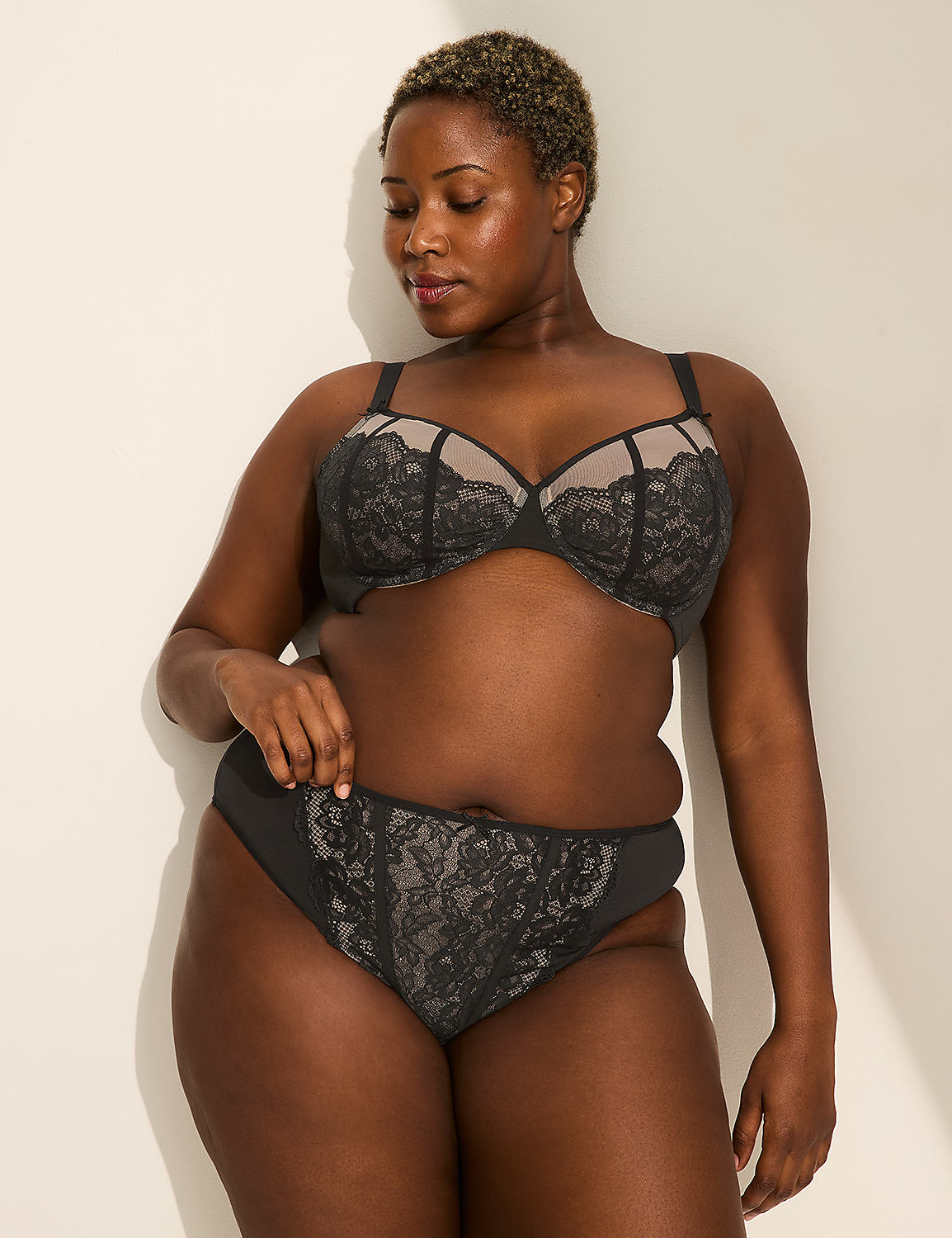 A person's dark-skinned buttocks are shown from the side, wearing black underwear, against a plain white background. Product Image 3