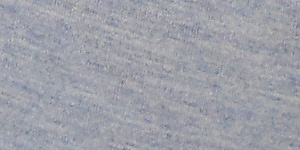A woman in a light blue polo shirt and matching pants stands against a plain, light background. Product Image 4