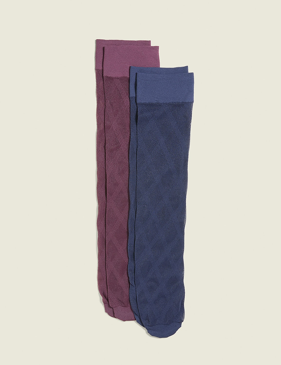 Two pairs of knee-high socks, one burgundy and one navy blue, lie side-by-side against a plain, light beige background. Product Image 1