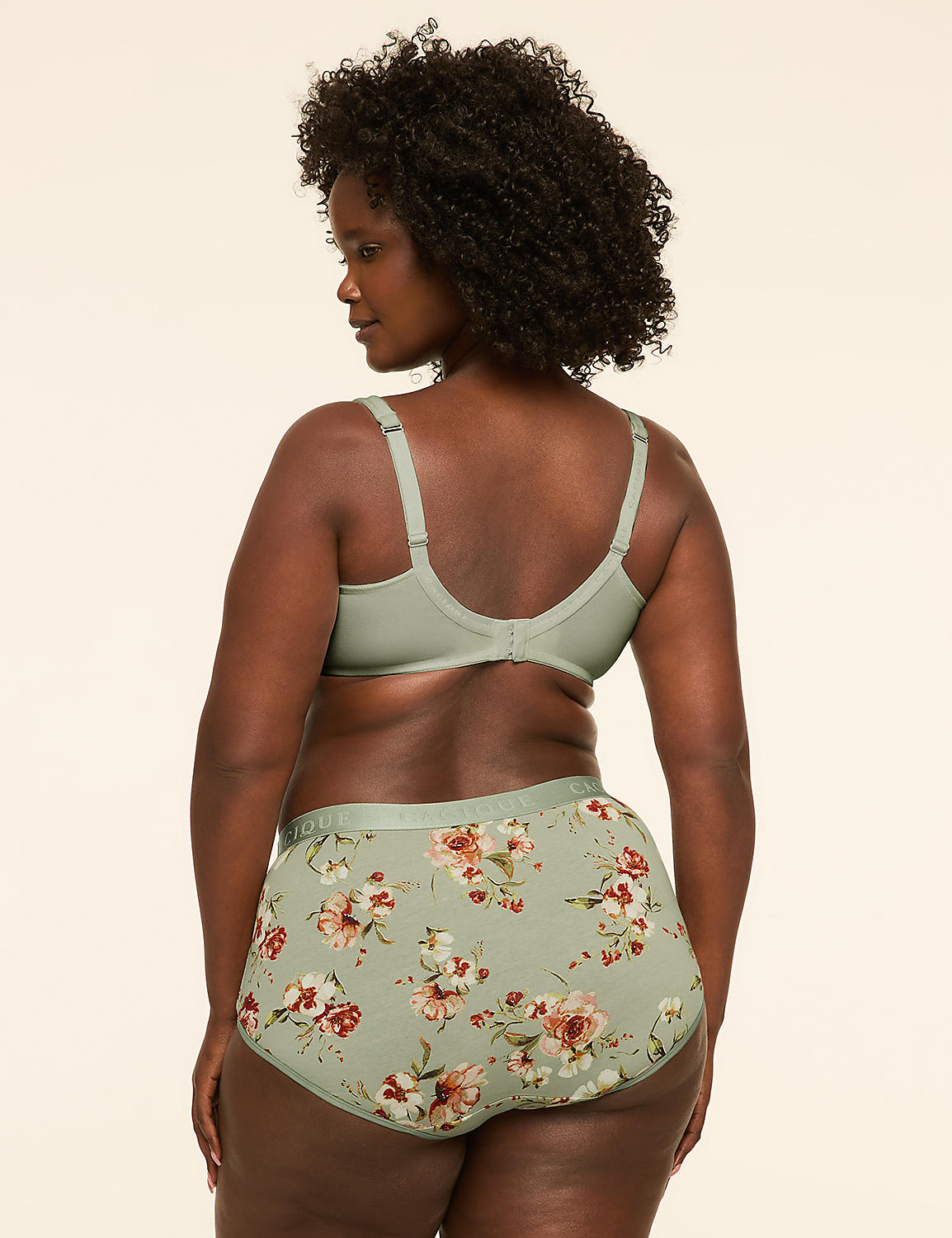 A woman in a floral bra and high-waisted underwear stands against a plain, light-colored background. Product Image 2
