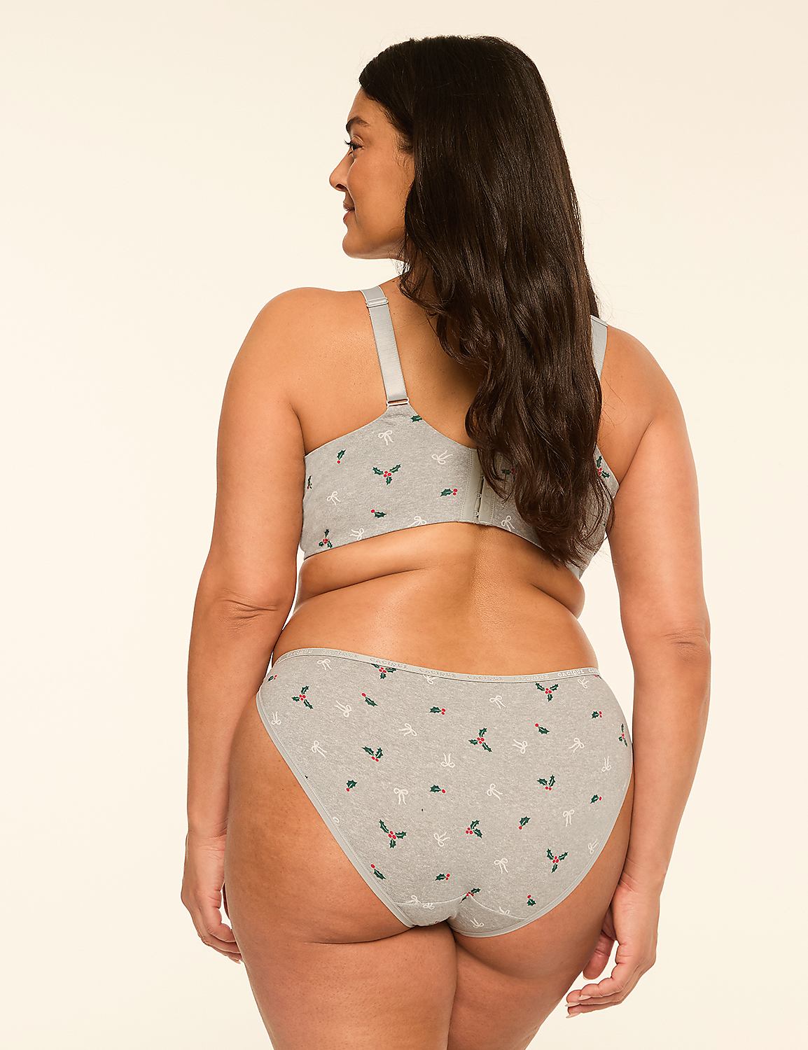 A woman in a grey holly-patterned bra and underwear is shown from the back against a plain, light-colored background. Product Image 2
