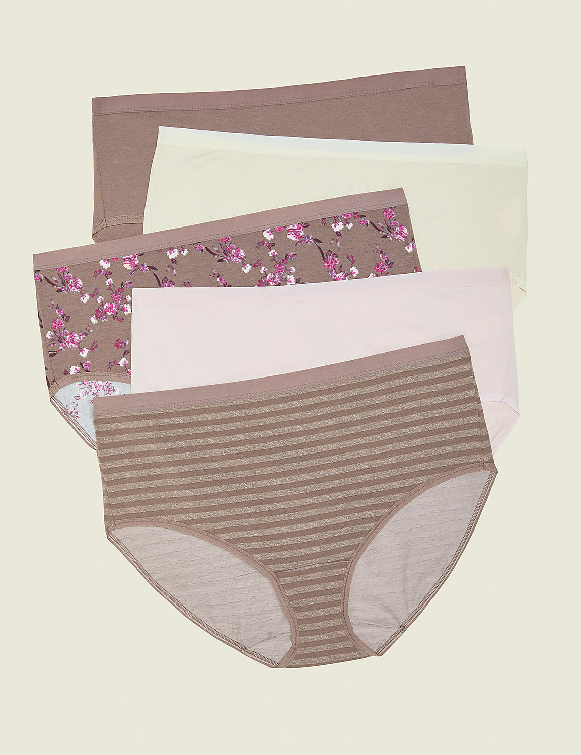 Five pairs of women's underwear, with varying patterns and colors, are neatly stacked against a plain, light-colored background. Product Image 1