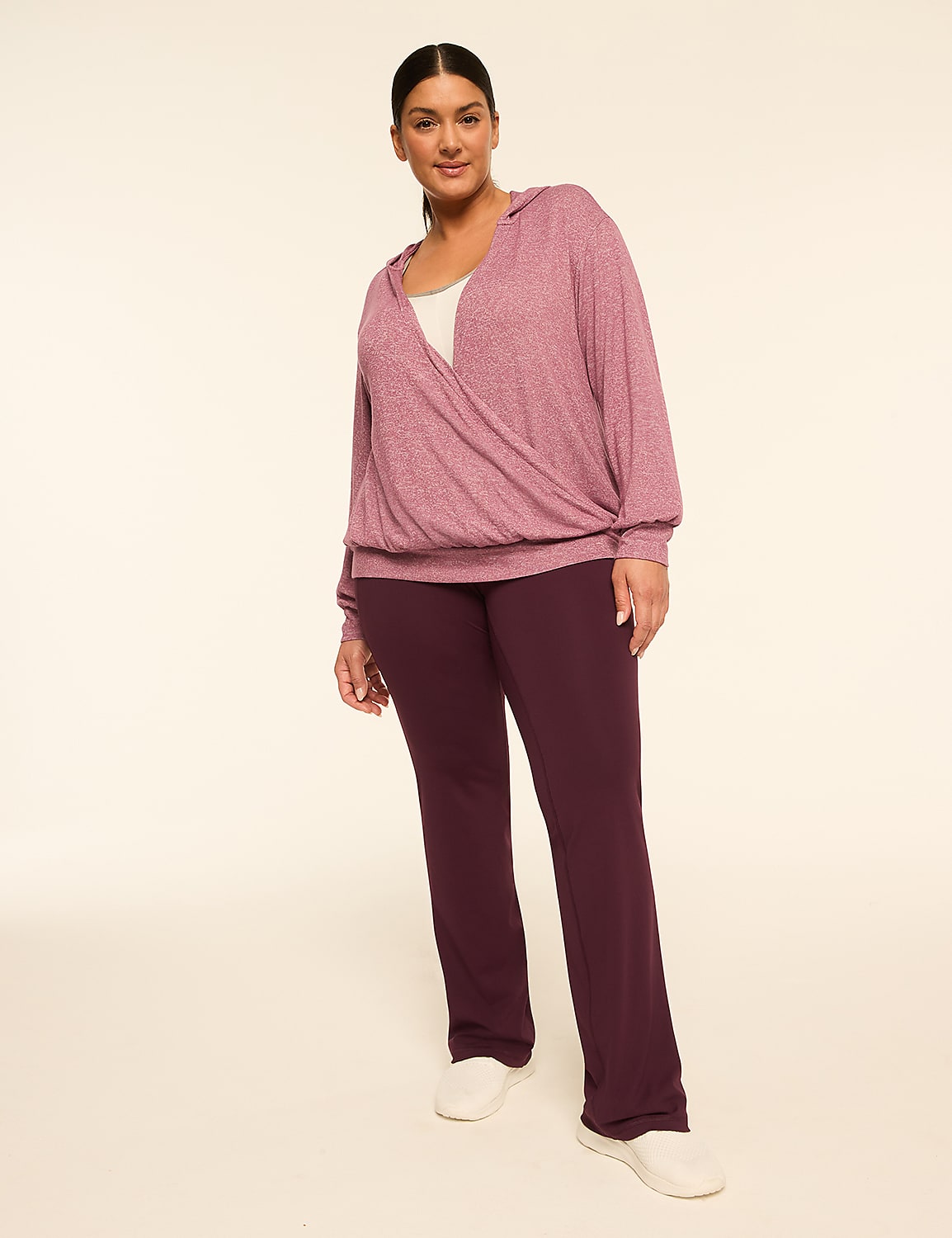 A woman in a mauve wrap hoodie and plum pants stands against a plain, light-colored background. Product Image 3