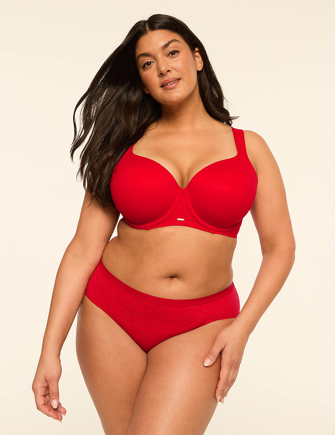 A woman in a red bra and underwear stands against a plain, light-colored background. Product Image 4