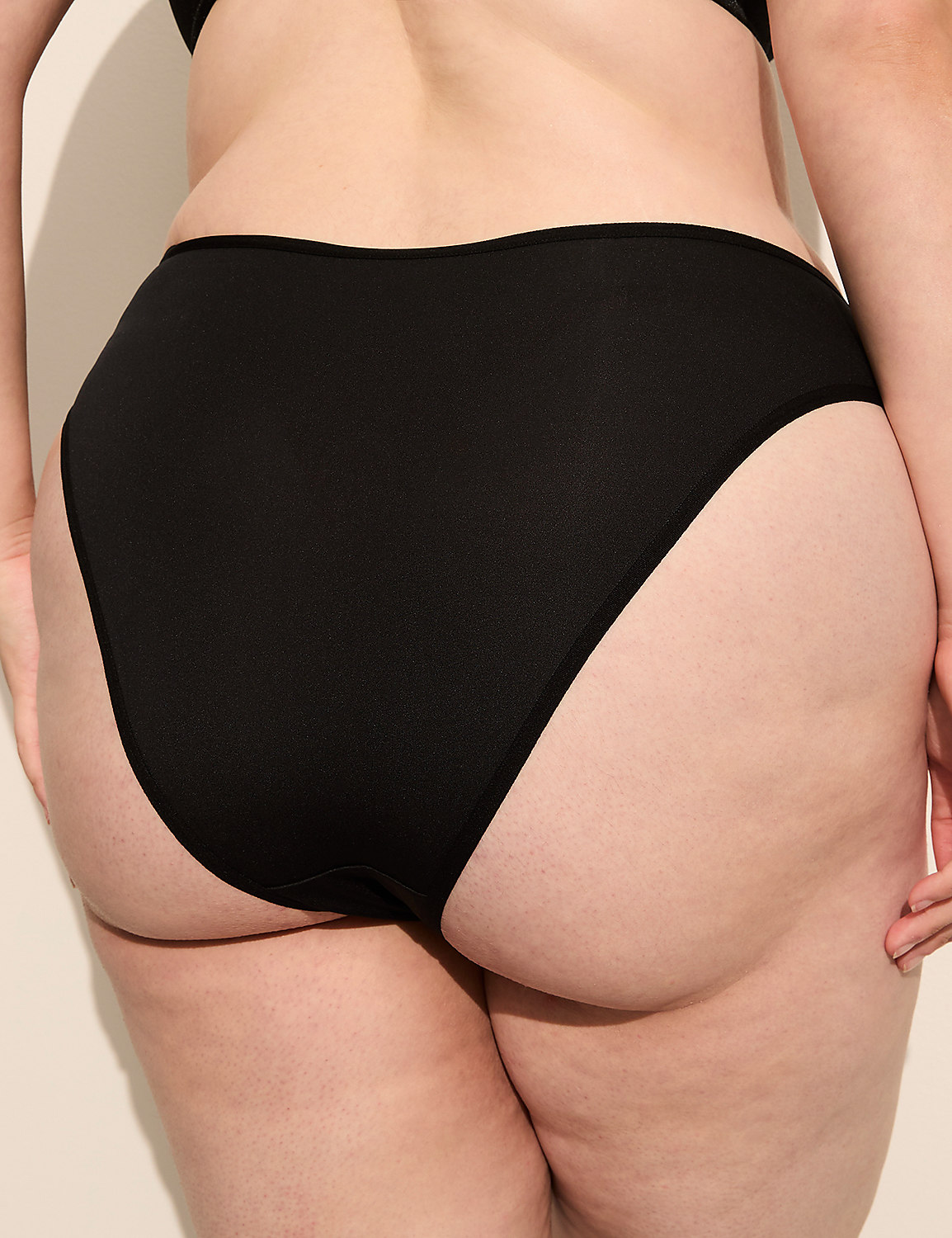 A person's lower back and buttocks are shown in black underwear against a plain background. Product Image 2