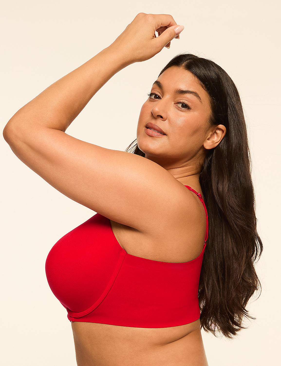 A woman in a red bra poses with her arm raised against a plain, light background. Product Image 3