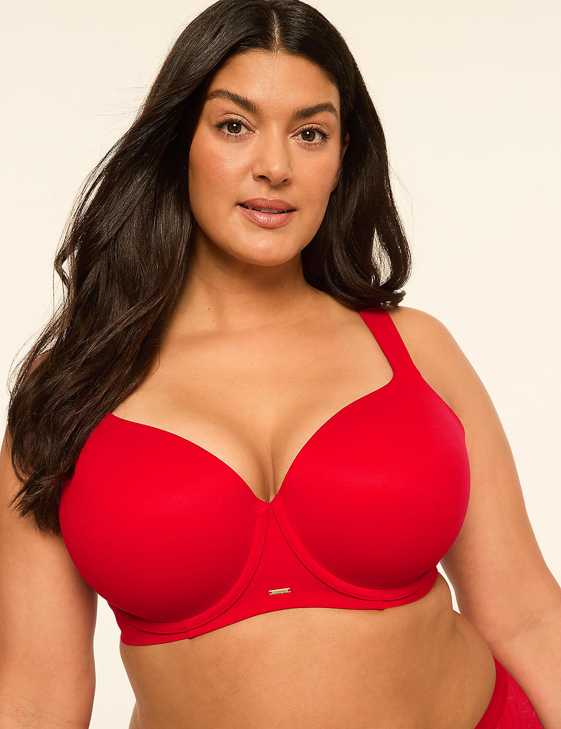 A woman with dark hair and a red bra is in the foreground, against a plain, light-colored background. Product Image 1