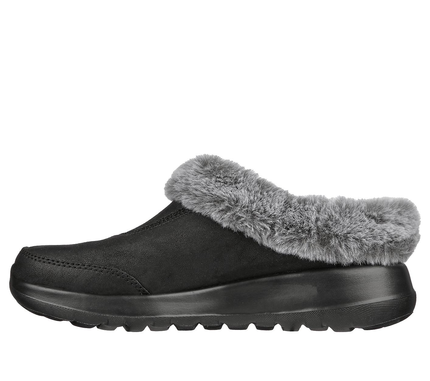 A black mule slipper with a grey fur lining rests on a black sole against a plain white background. Product Image 2