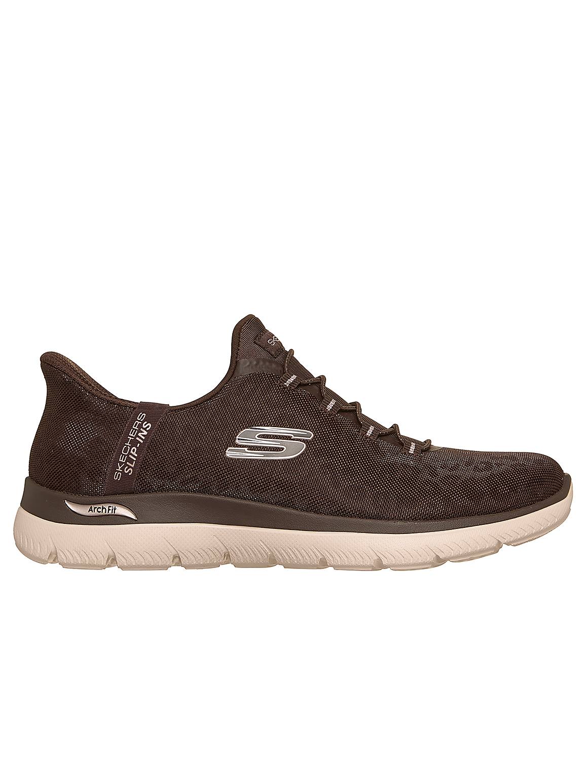 A brown Skechers slip-on sneaker with a white sole is presented against a plain white background. Product Image 1