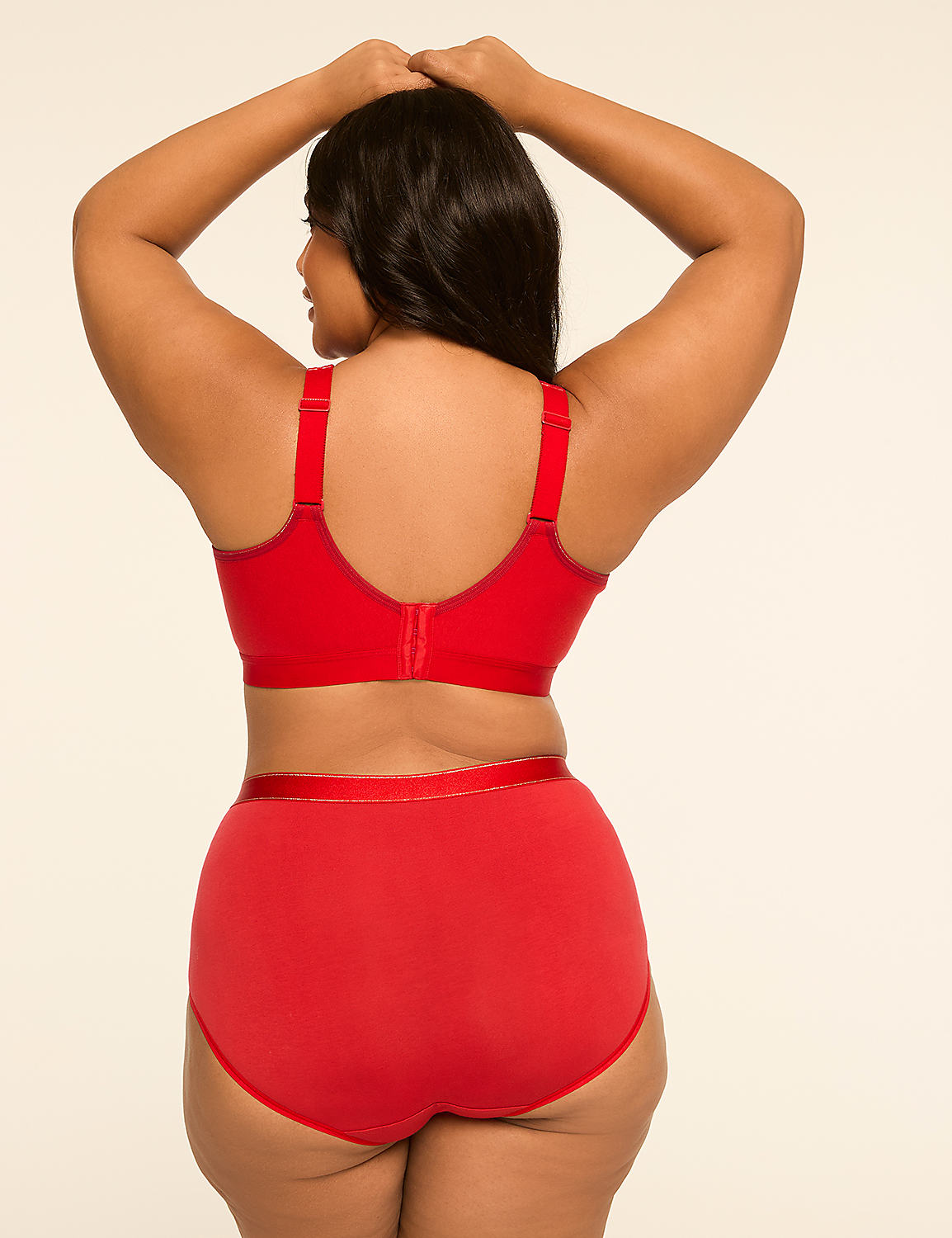 A woman in red lingerie stands with her back to the viewer against a plain, light-colored background. Product Image 2