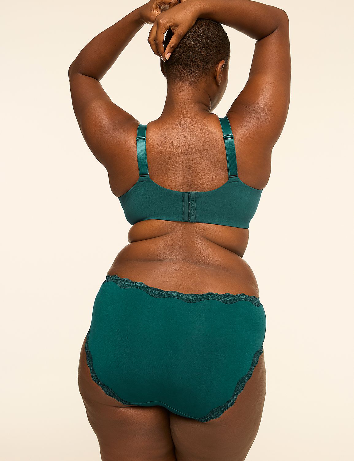 A woman in a teal bra and matching underwear stands with her back to the camera against a plain, light-colored background. Product Image 2