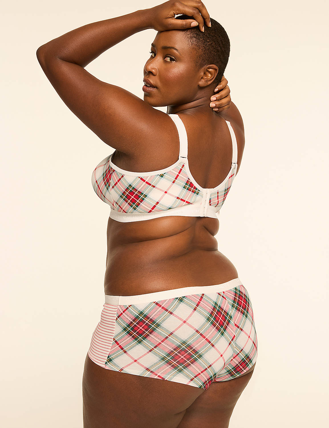 A woman in a plaid bra and shorts poses against a plain, light-colored background. Product Image 2