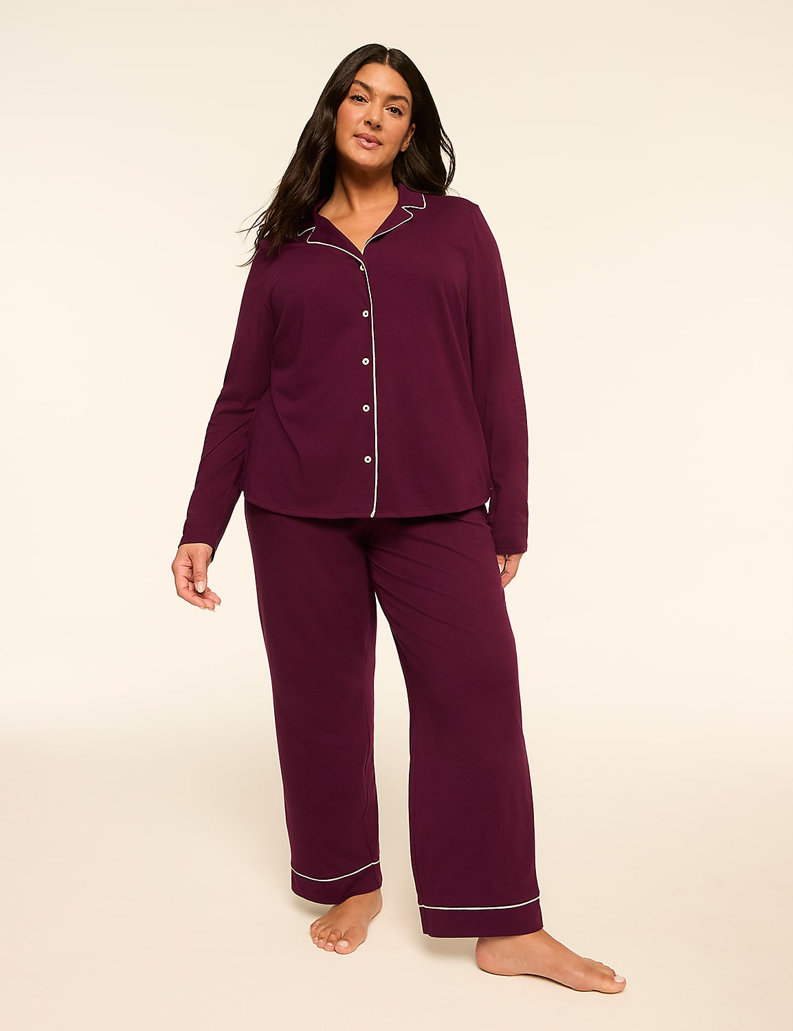 A woman in a plum-colored pajama set stands against a plain, light background. Product Image 1