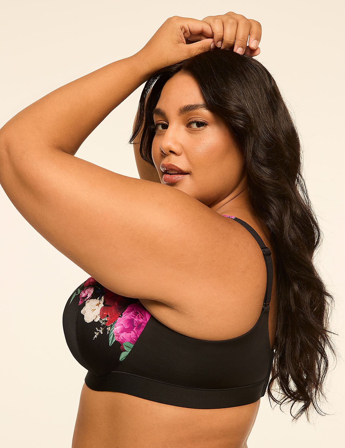 A woman with dark hair and a floral bra poses against a plain, light-colored background. Product Image 3