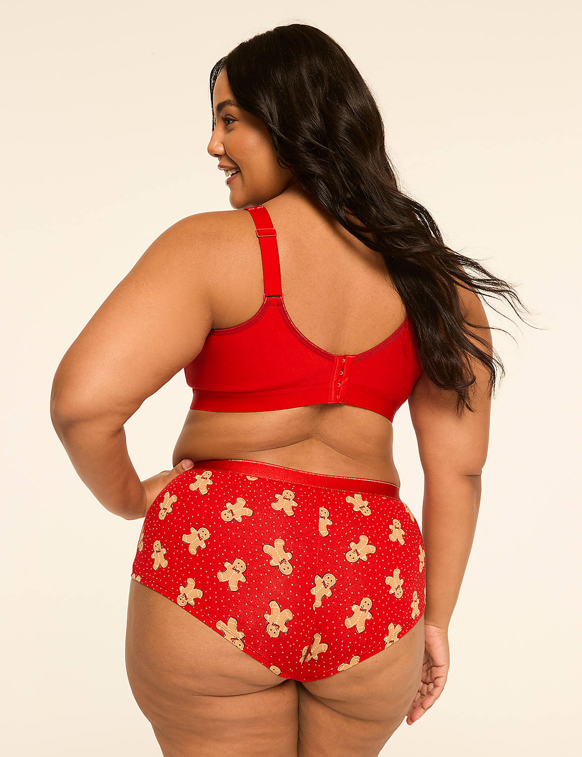 A woman in red gingerbread-patterned underwear stands against a plain, light-colored background. Product Image 2