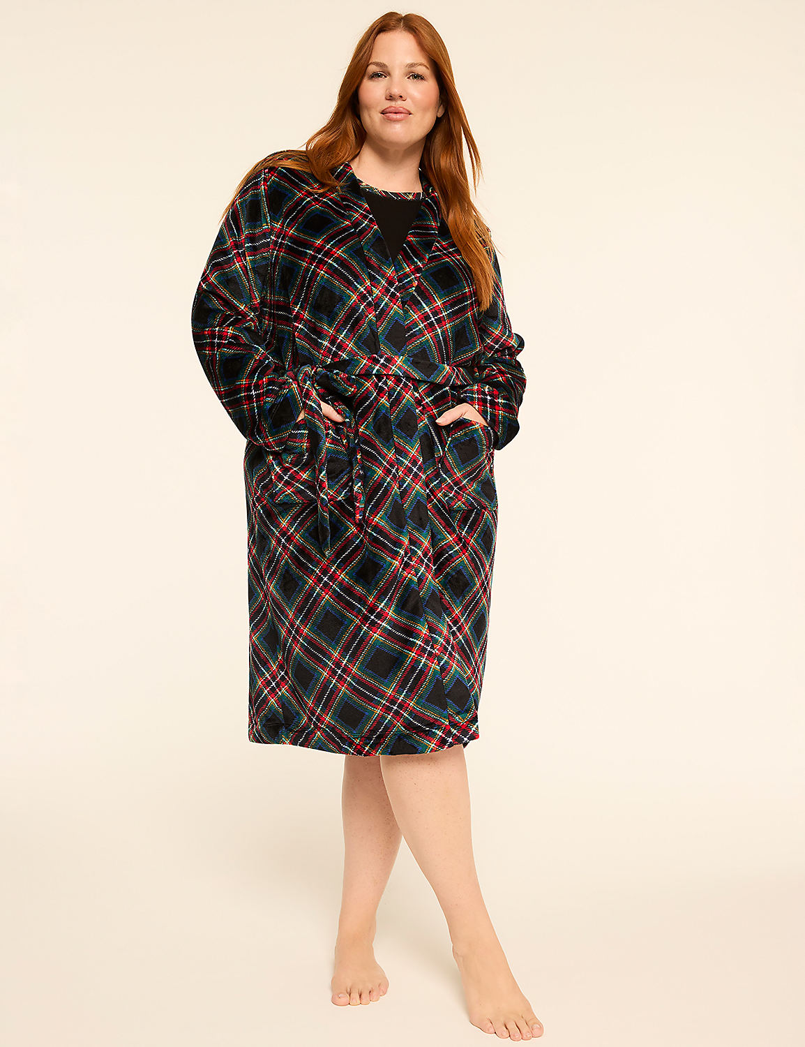 A woman in a plaid robe stands barefoot against a plain, light background. Product Image 1