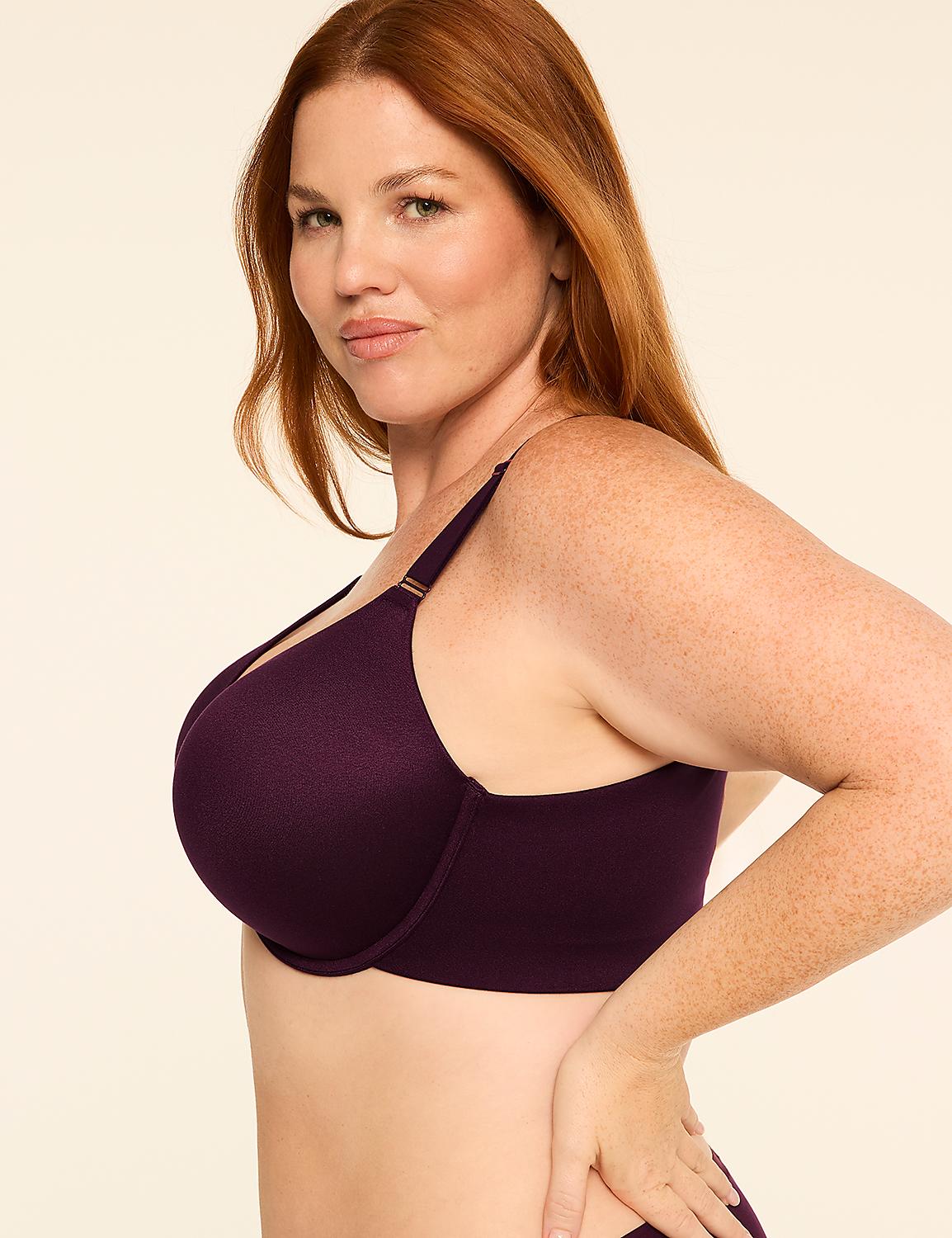 A woman with red hair and freckles poses in a dark purple bra against a plain, light-colored background. Product Image 3