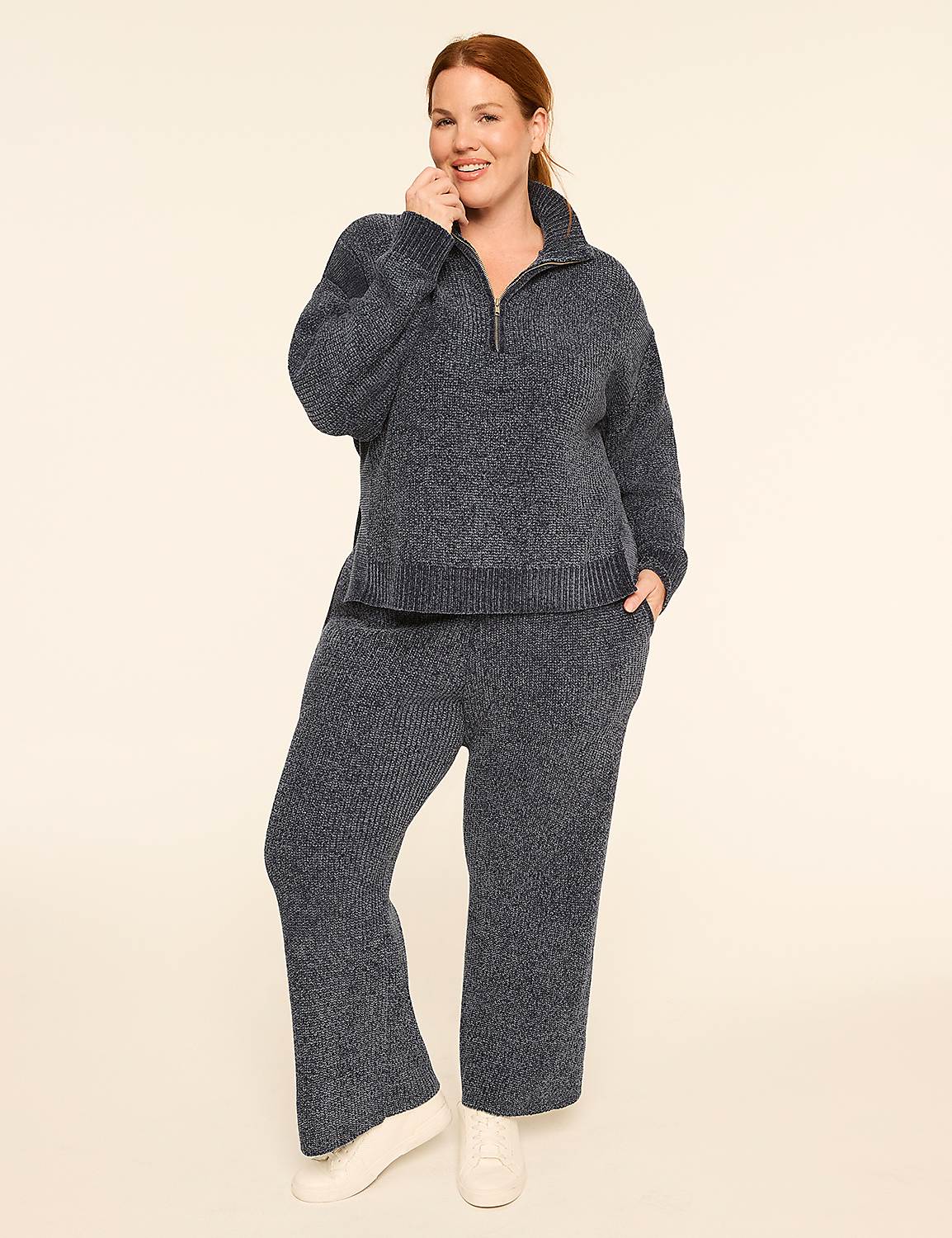 A woman in a cozy blue loungewear set stands against a plain, light-colored background. Product Image 3