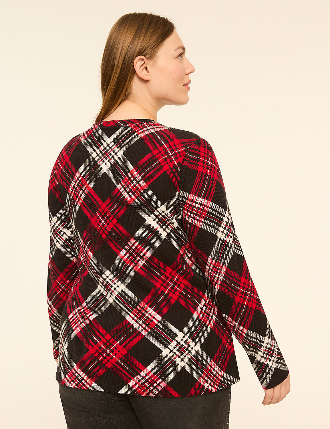 A woman in a red, black, and white plaid shirt is shown from the back against a plain, light-colored background. Product Image 2