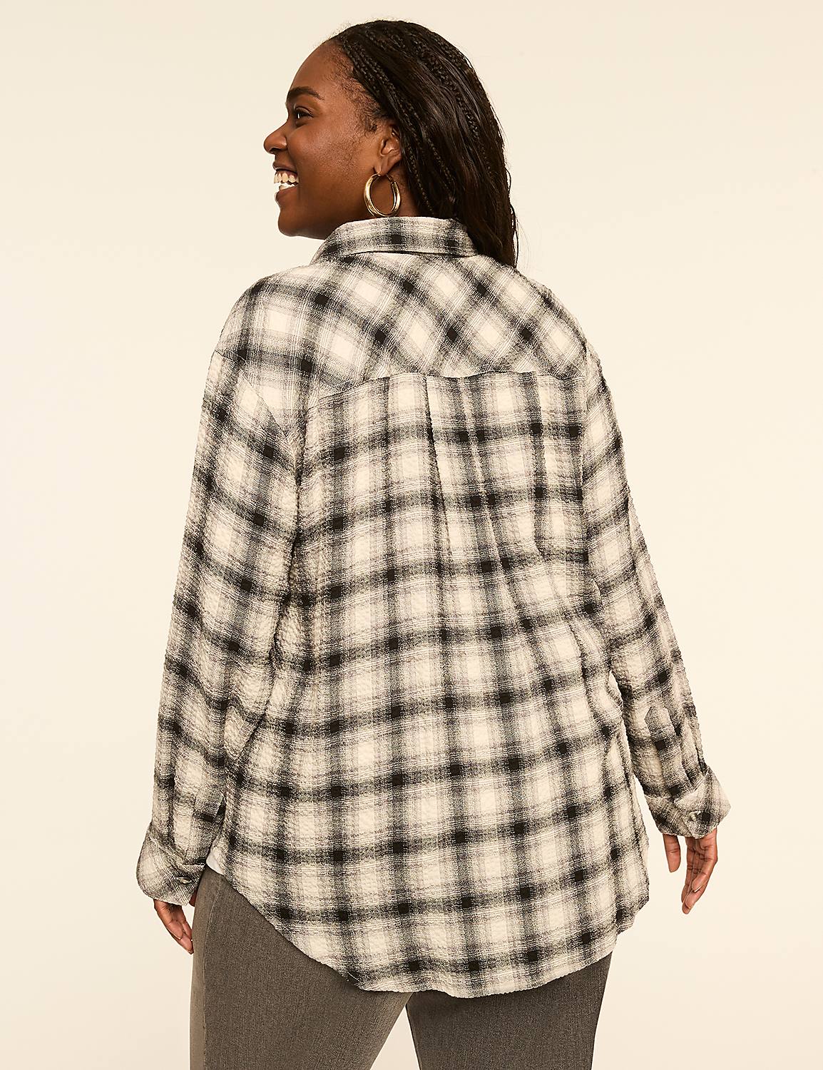 A woman in a plaid shirt is shown from the back against a plain, light-colored background. Product Image 2