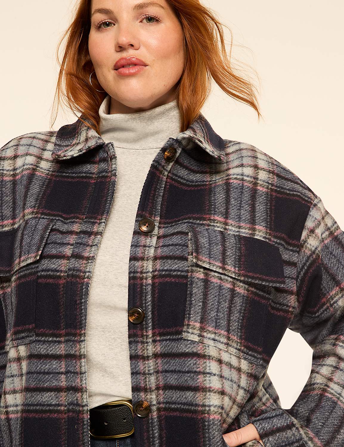A woman in a plaid shacket and turtleneck stands against a plain, light-colored background. Product Image 3