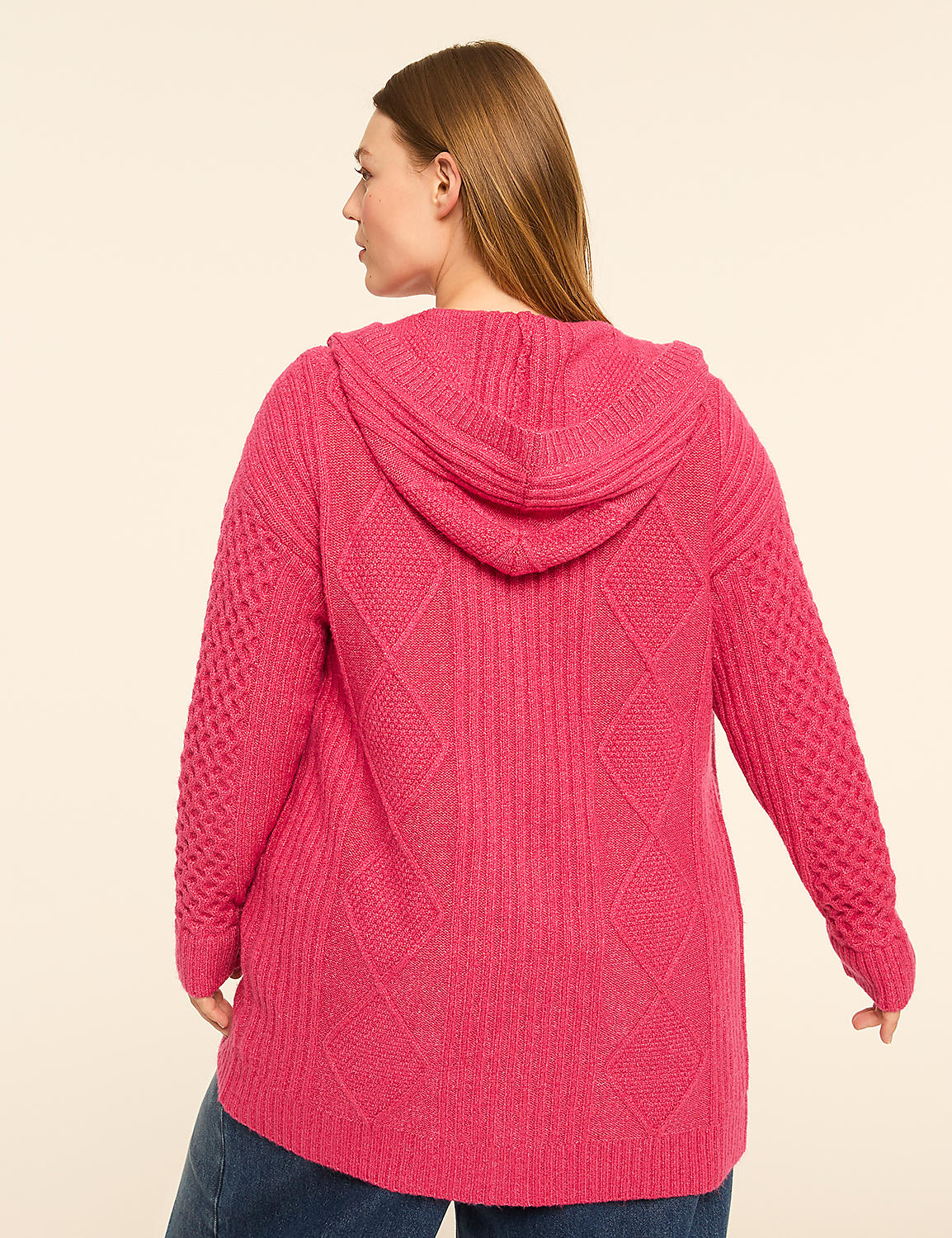 A woman in a pink hooded cardigan stands against a plain, light-colored background. Product Image 2