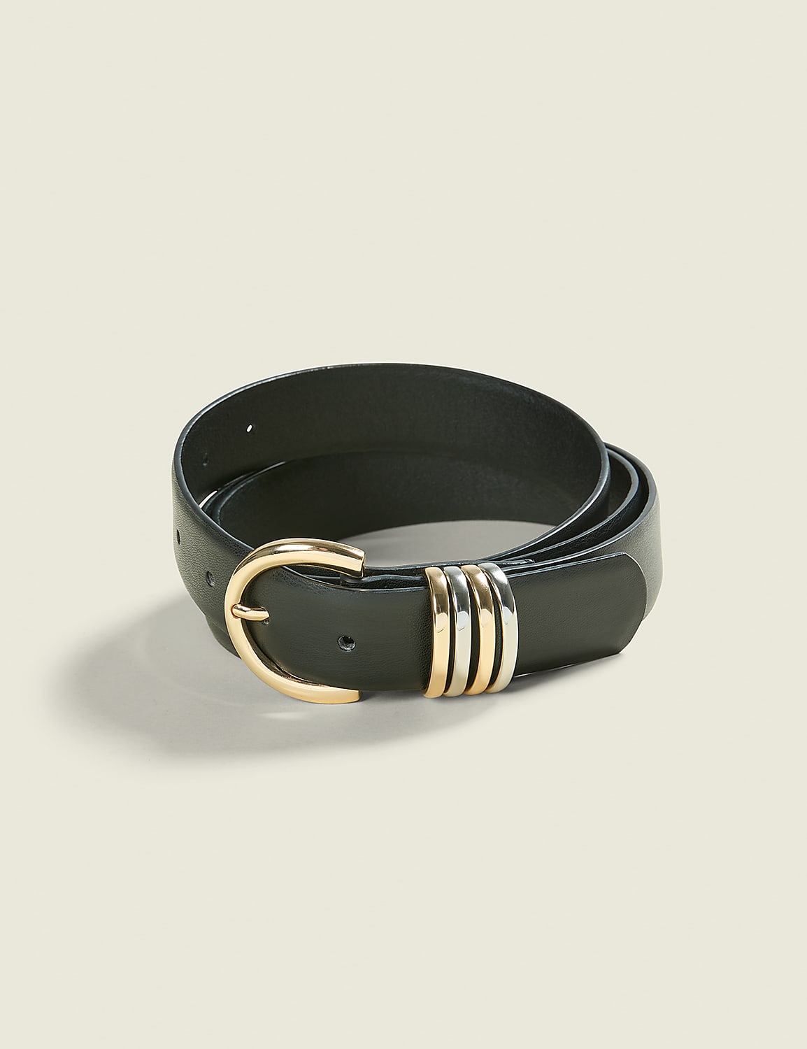 A dark leather belt with a gold buckle and three metal rings rests on a plain, light-colored background. Product Image 2