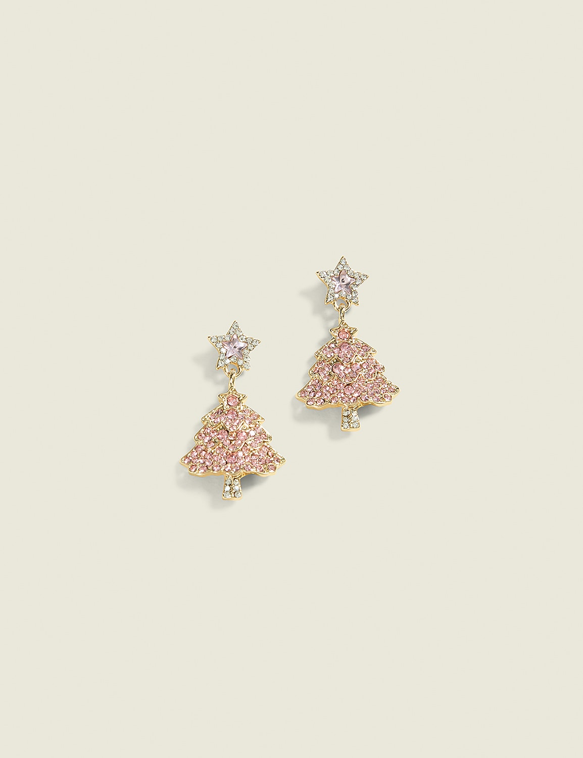 A pair of pink Christmas tree-shaped earrings with star toppers dangle against a plain, light-colored background. Product Image 1