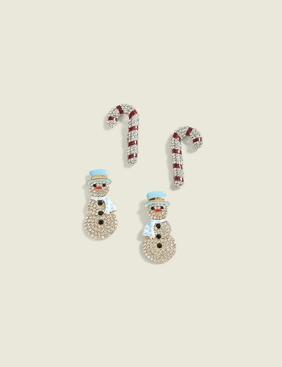 Two sparkly snowman charms and two candy cane charms are arranged on a pale, textured background. Product Image 1
