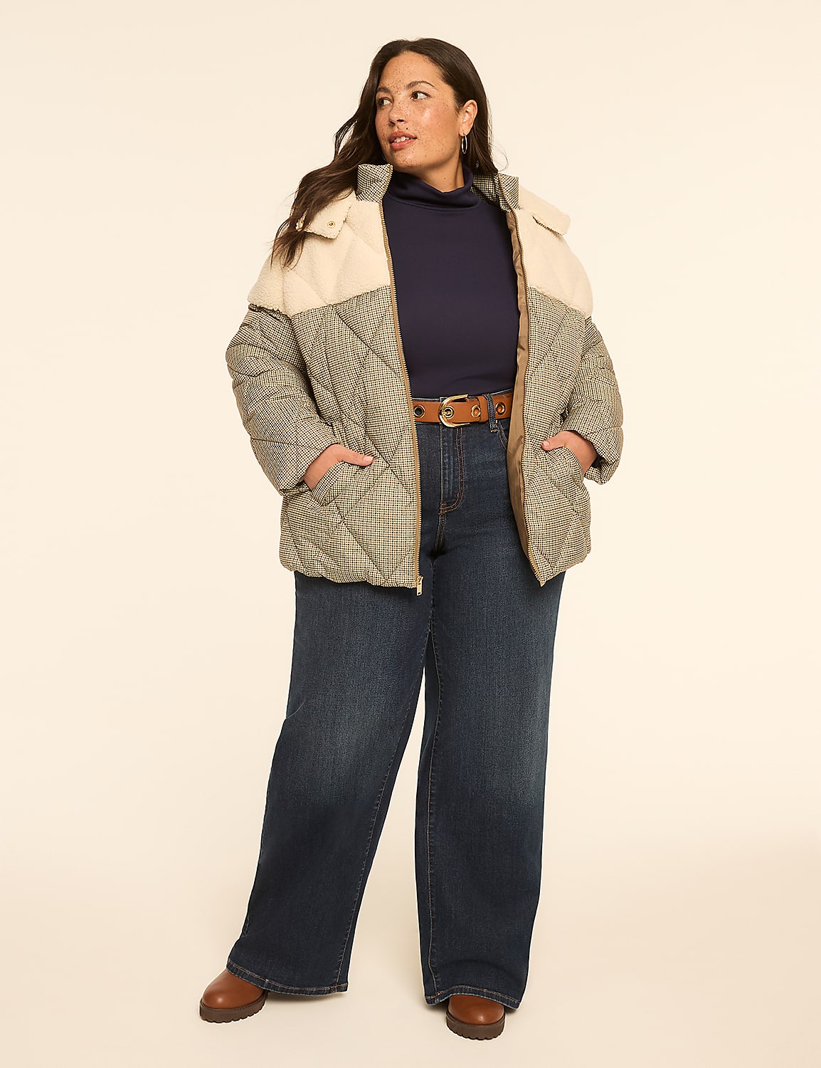A woman in a quilted jacket and wide-leg jeans stands against a plain, light-colored background. Product Image 3