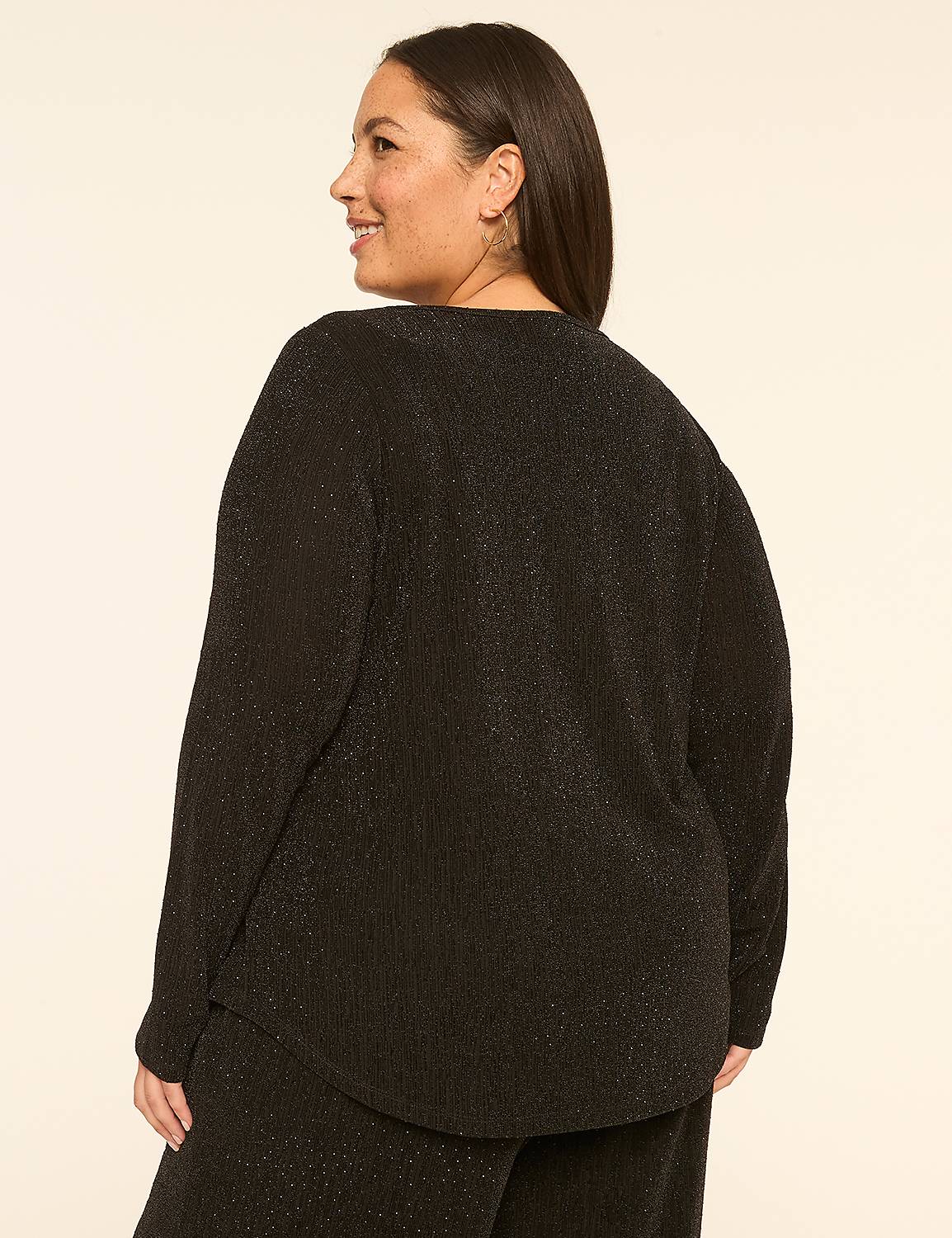 A woman in a black sparkly top and pants stands against a plain, light-colored background. Product Image 2