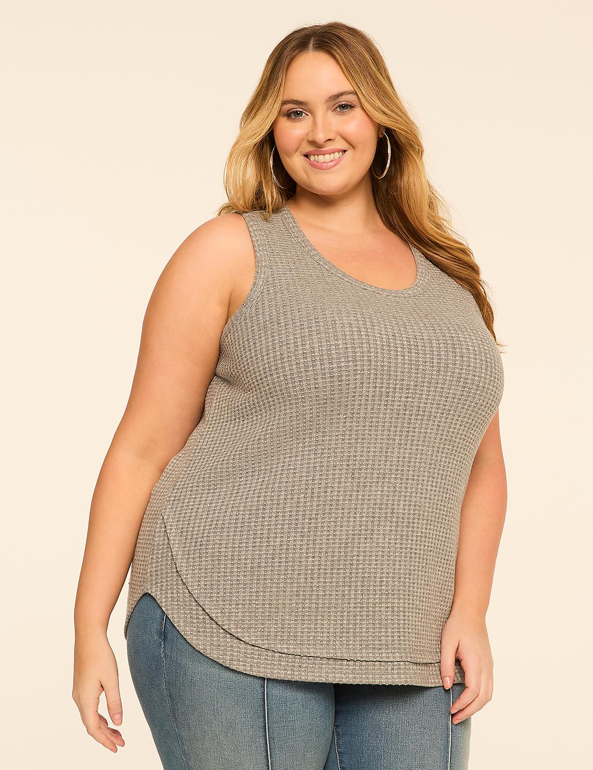 A smiling woman with blonde hair and a gray waffle-knit tank top stands against a plain, light-colored background. Product Image 1