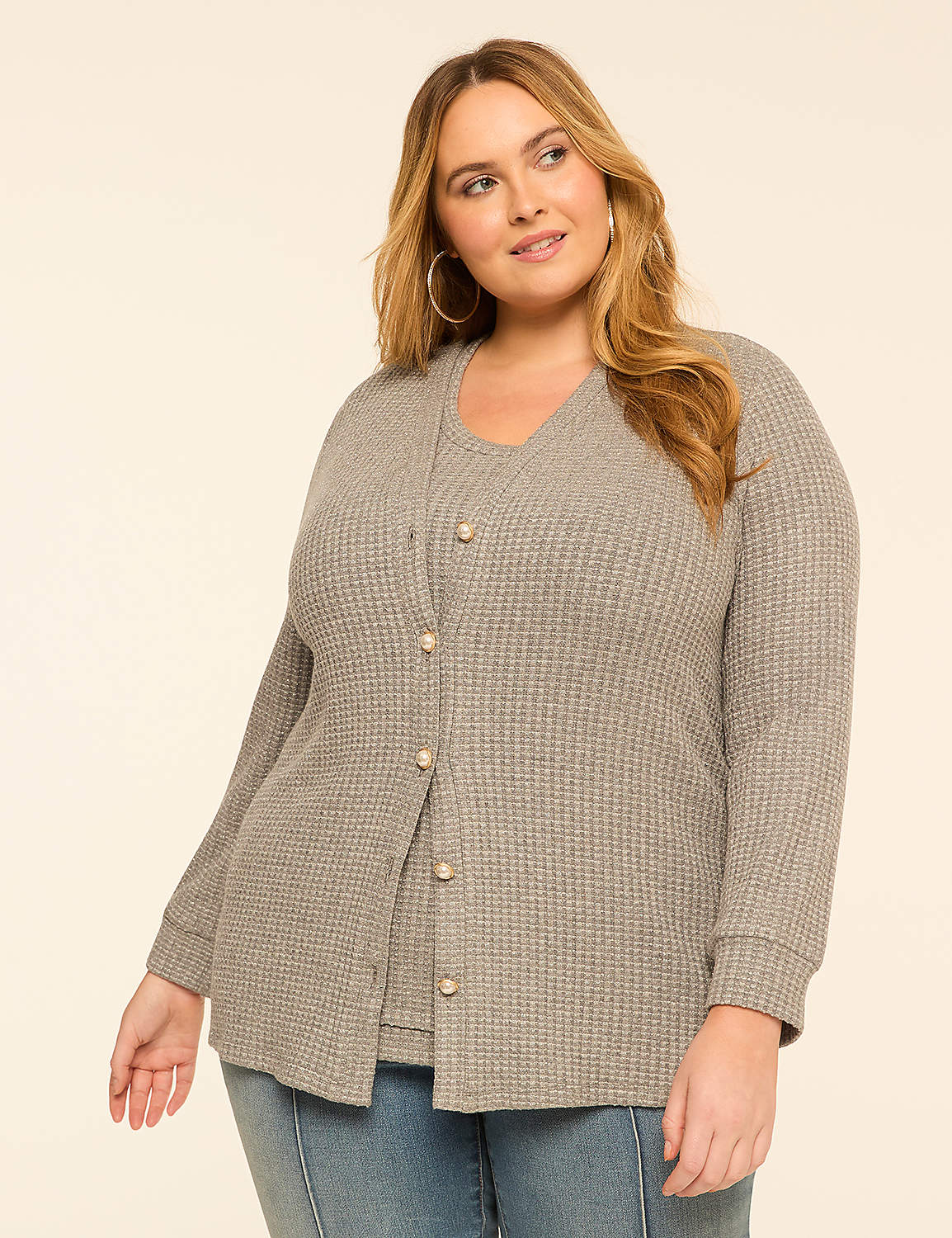 A woman in a grey waffle-knit cardigan and camisole stands against a plain, light-colored background. Product Image 1